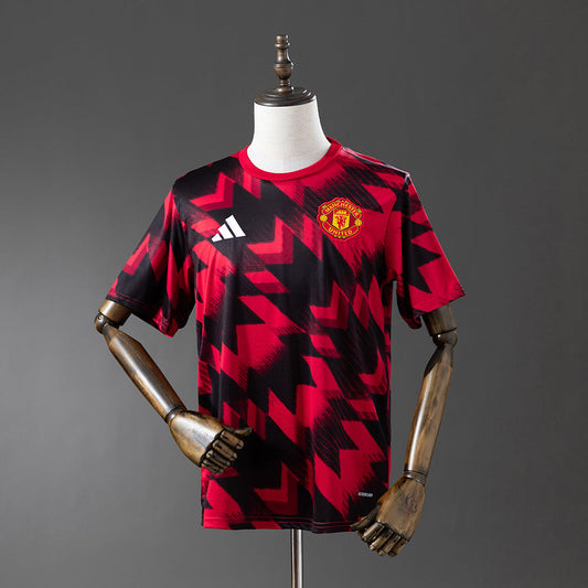 MANCHESTER UNITED CALENTAMENTO I 25/26 HOMBRE
